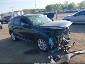  Salvage Mazda Cx