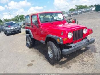  Salvage Jeep Wrangler